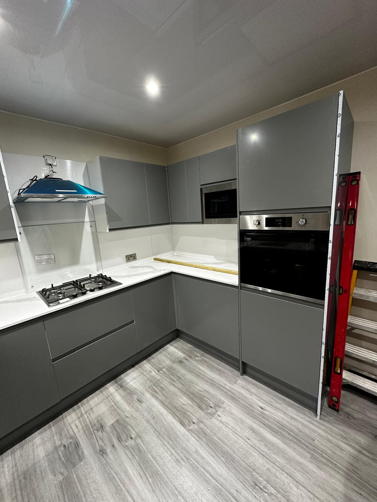 Modern grey handleless kitchen install
