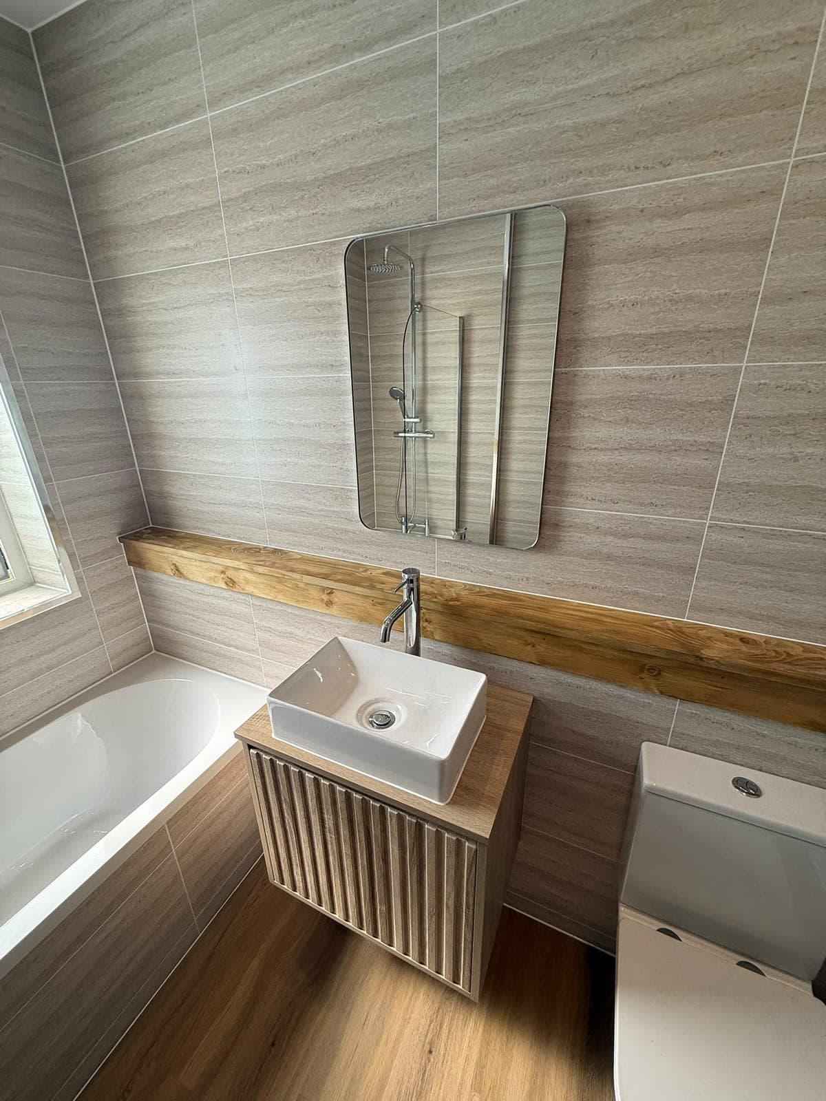 Wall-hung fluted vanity unit with a countertop basin, Kirkcaldy