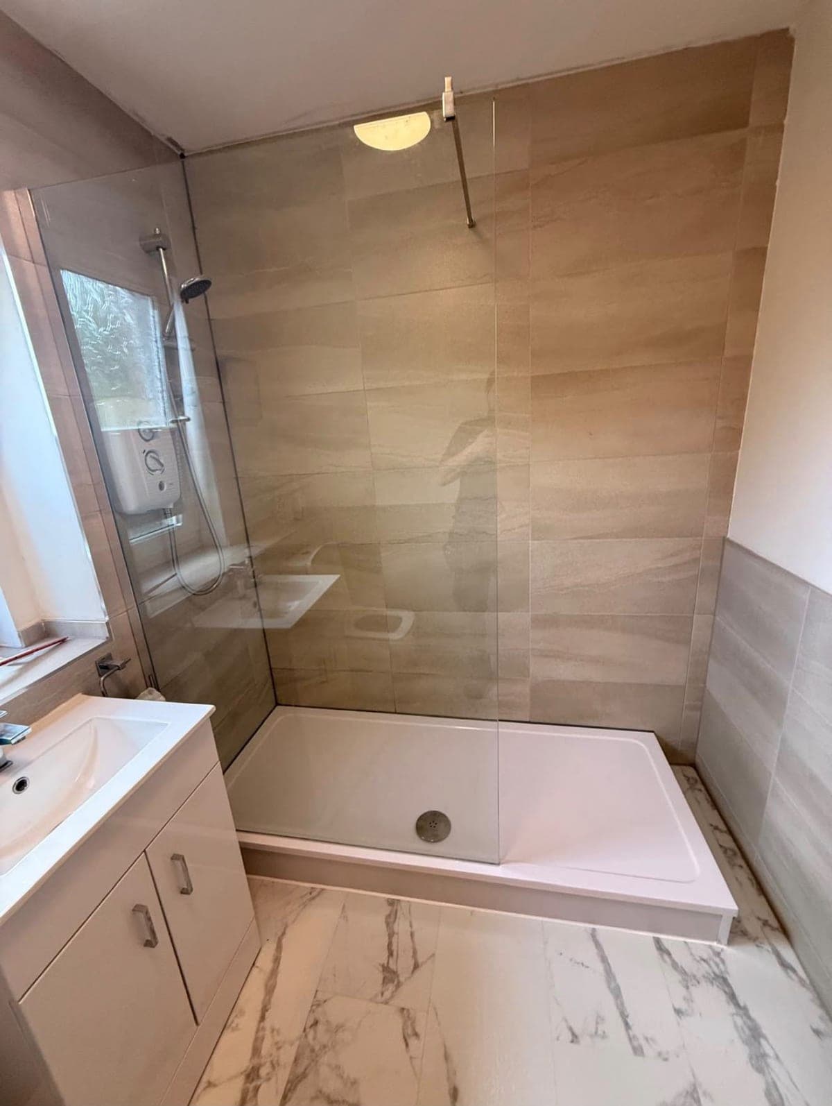 Walk-in shower with a low-profile tray and glass screen, Edinburgh